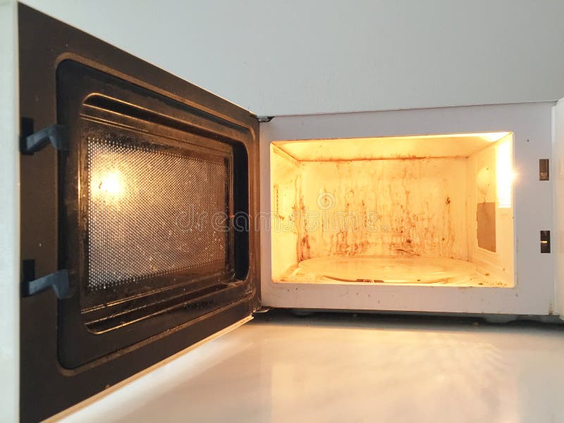 Inside of a dirty microwave oven. Inside of a dirty microwave oven