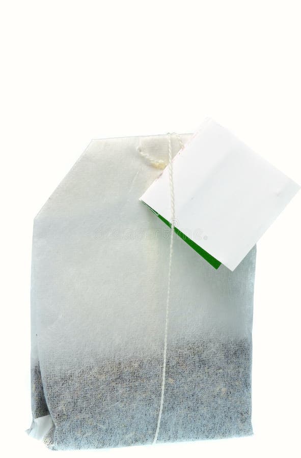 A teabag on a string with a blank copy space label. A teabag on a string with a blank copy space label