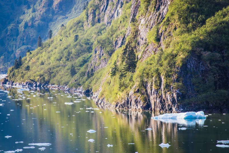 Diminishing glacier melts in waters created by climate change's effects on Mendenhall Glacier, Juneau, Alaska. Diminishing glacier melts in waters created by climate change's effects on Mendenhall Glacier, Juneau, Alaska.