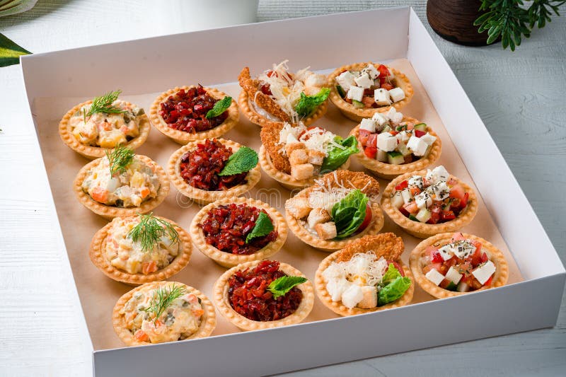 Snack Food Delivery for Catering. Box with Canape Snacks Shot Fresh