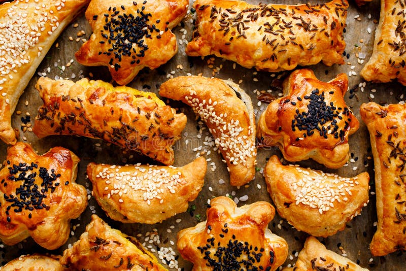 Snacks Puff Pastry with Various Fillings Sprinkled with Seeds Stock