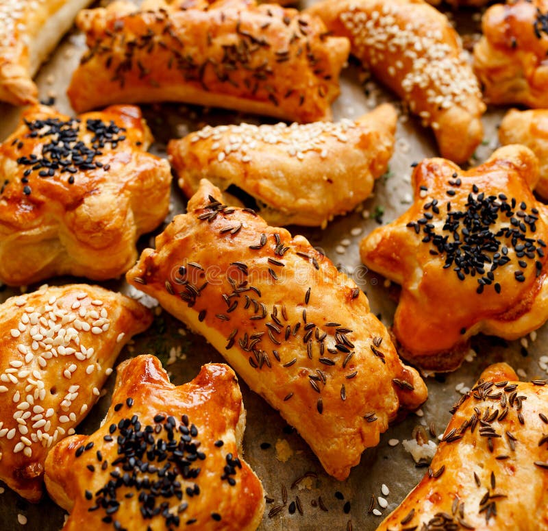 Puff Pastry with Mushroom Filling Sprinkled with Nigella Seeds on a