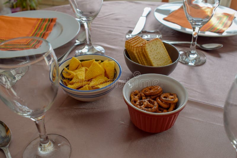 Snacks and Wine Glasses on Beautifully Served Table - Family Meal royalty free stock photo Snacks and Wine Glasses on Beautifully Served Table - Family Meal royalty free stock photo