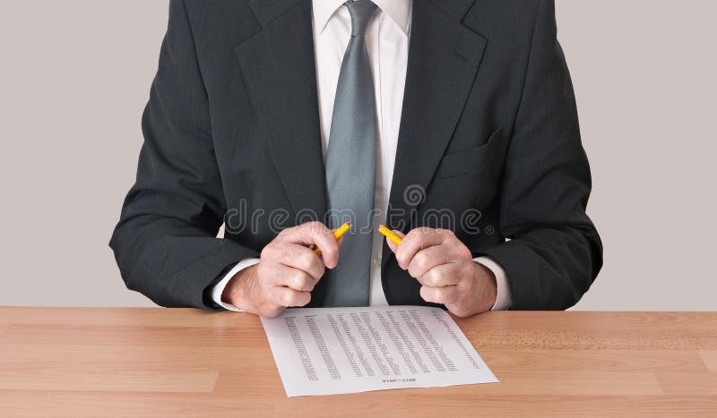 Snapped - man at desk with broken pencil, stress