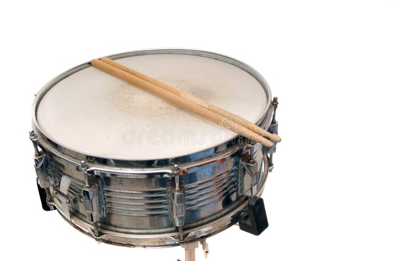 Snare drum with drum sticks on top