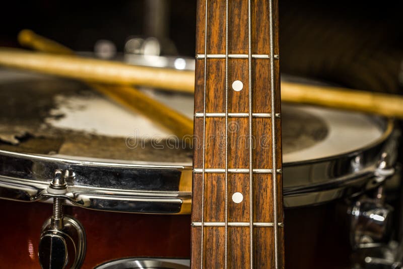 Snare Drum with Drumsticks and Bass Guitar Stock Photo Image of instrument, announcement 84697328