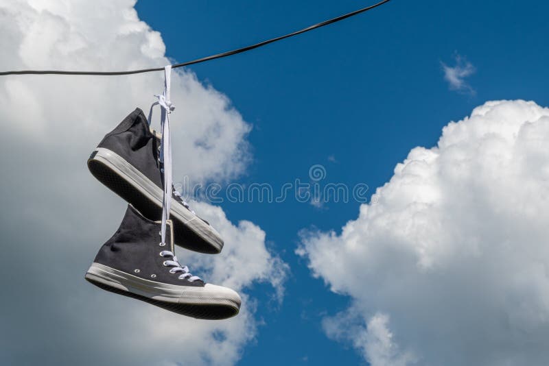 Sneakers Hanging on Electric Wires Stock Photo - Image of electrical ...