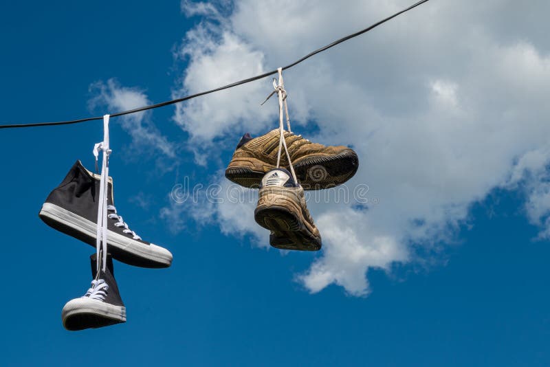 Sneakers Hanging on Electric Wires Editorial Image - Image of ...