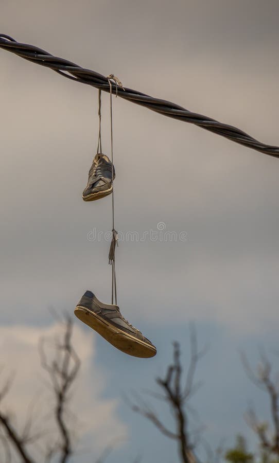 Hanging from power lines hi-res stock photography and images - Alamy