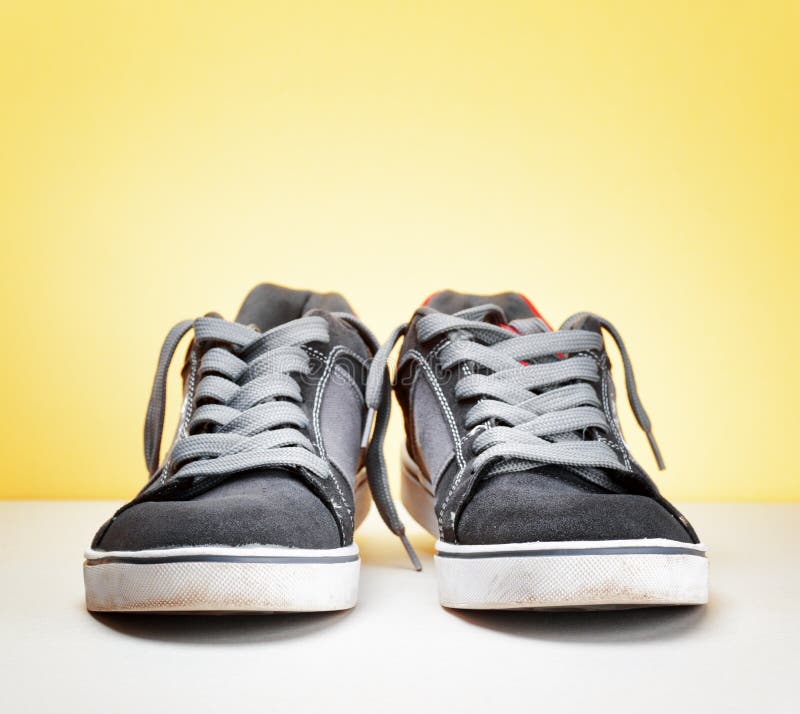Pair of Grey Sneakers on Colorful Background Stock Photo - Image of ...