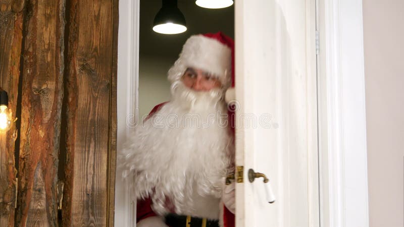 Sneaking Santa Claus Secretly Entering The Living Room