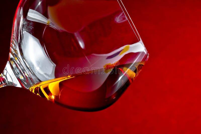 Snifter of brandy in elegant glass with space for text stock images
