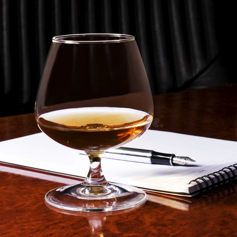 Snifter glass of cognac stock photo. Image of brandy 16330410