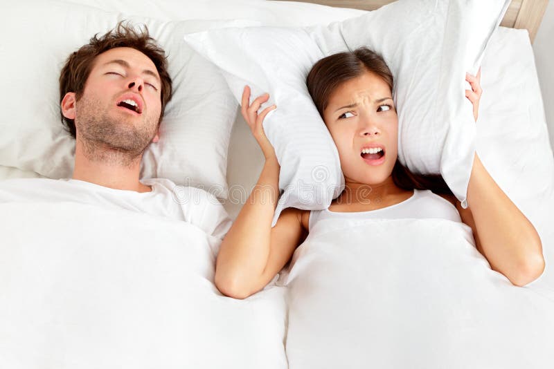 Snoring man - couple in bed