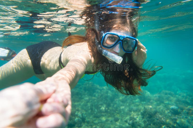 She is snorkelling