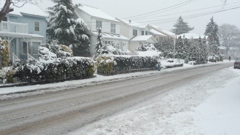 Snow along suburban street