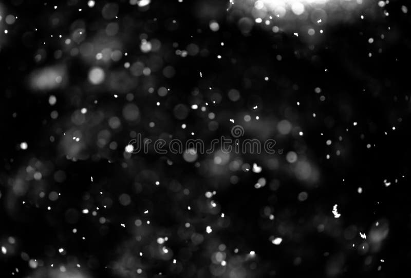 Snow on black background stock image. Image of fall - 164403209