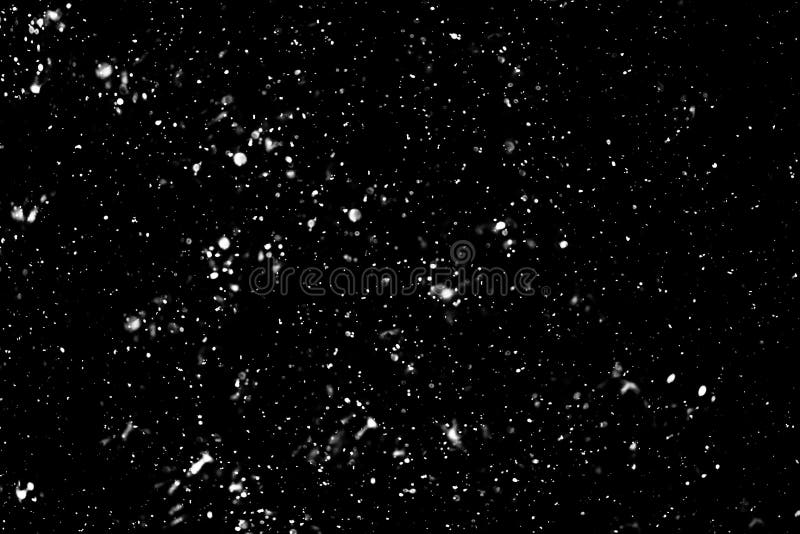 Snow on black background stock photo. Image of isolated - 164981530