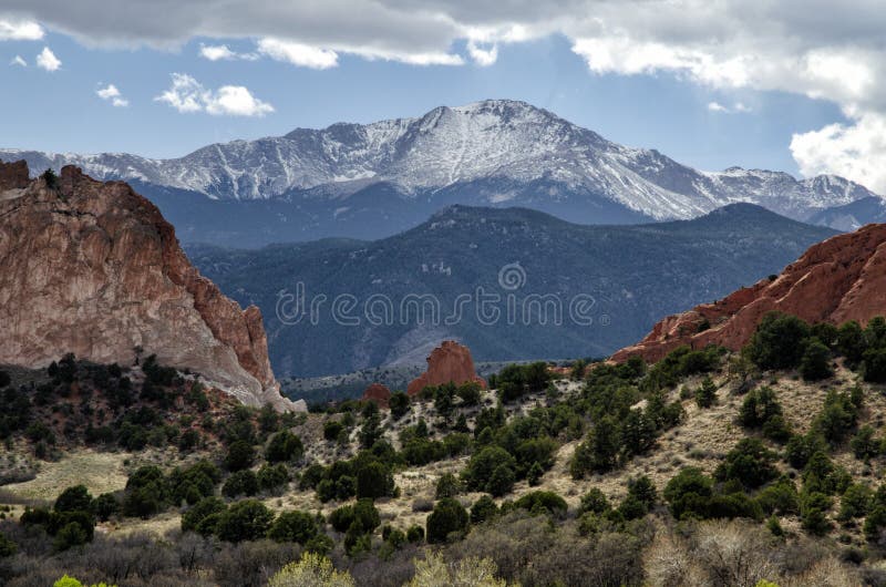 Snow capped Pike`s Peak at the Garden of the Gods in Colorado Springs. Snow capped Pike`s Peak at the Garden of the Gods in Colorado Springs.