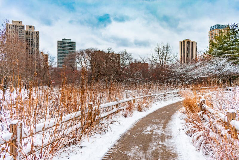 Snow Covered Fenced in Trail by North Pond in Lincoln Park Chicago stock photo Snow Covered Fenced in Trail by North Pond in Lincoln Park Chicago stock photo