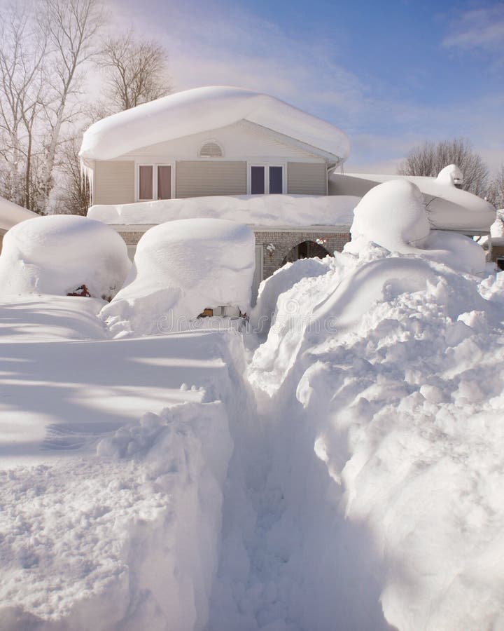snow-covered-house-blizzard-roof-cars-deep-white-western-new-york-weather-concept-50392315.jpg