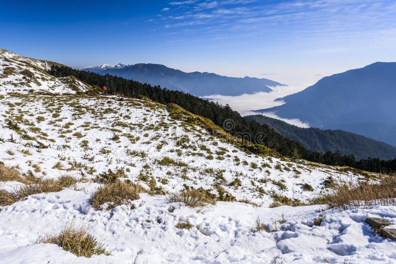 Snow covered mountains and blue sky in Hehuan Mountain of Taiwan