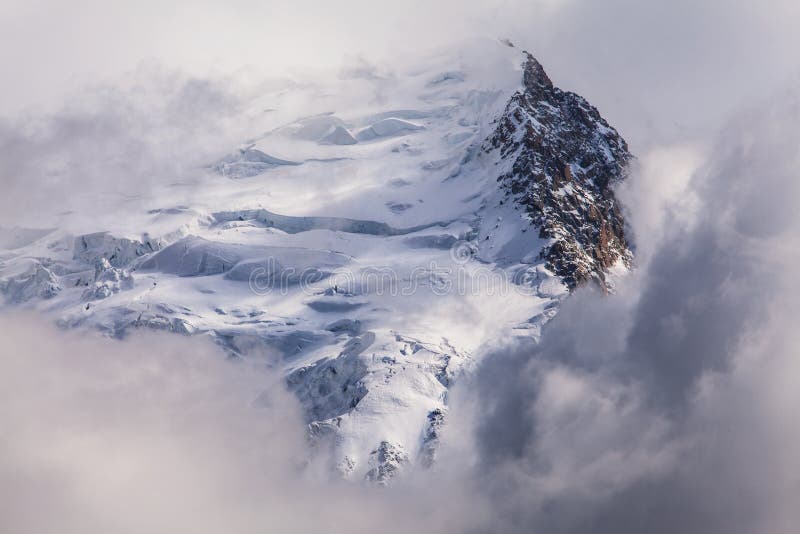 Snow covered mountains and rocky peaks in the French Alps