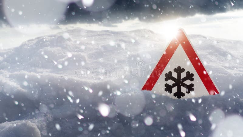 Winter driving - warning sign - risk of snow and ice