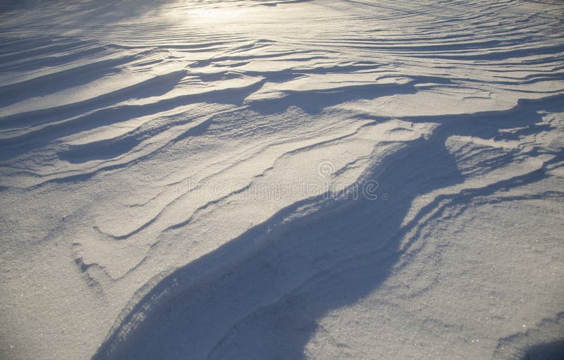 Snow dune background, bright sunlight stock photo