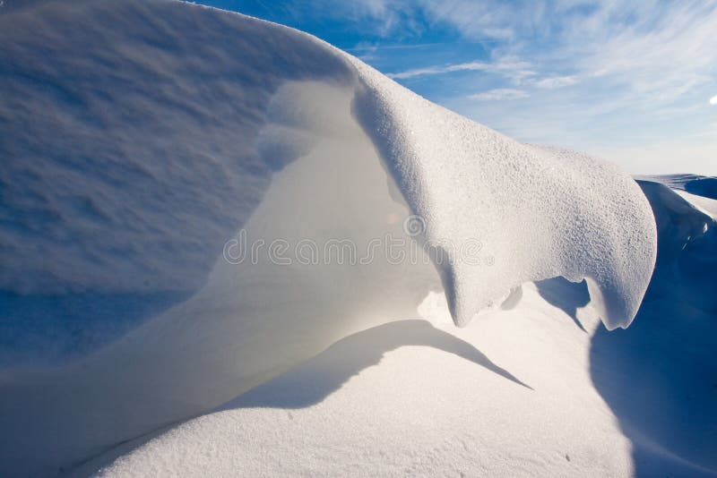 Snow dune in a ditch stock images