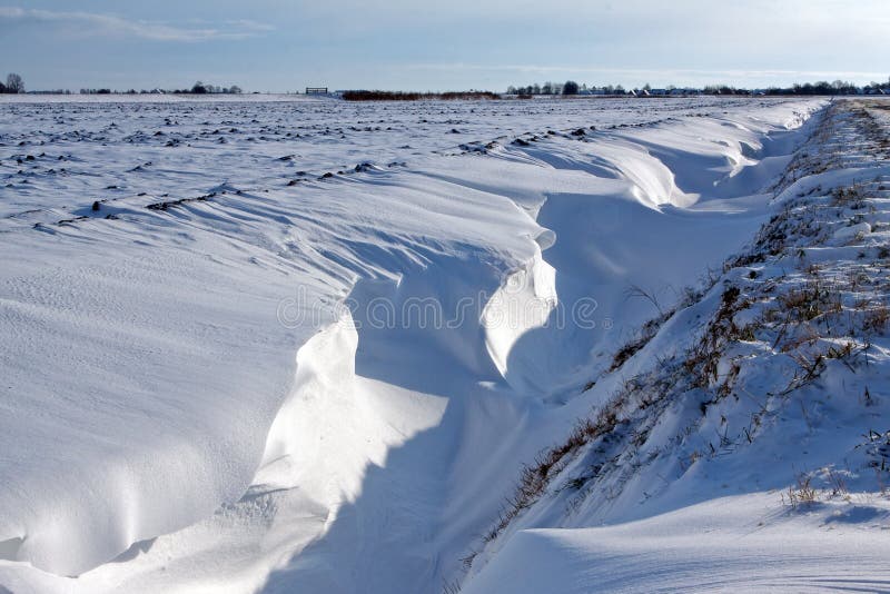Snow dune in a ditch royalty free stock image