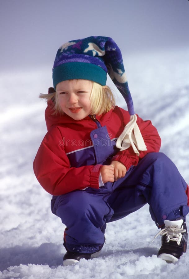 Snow Girl In Snowsuit And Cap Stock Photo Image 1886410