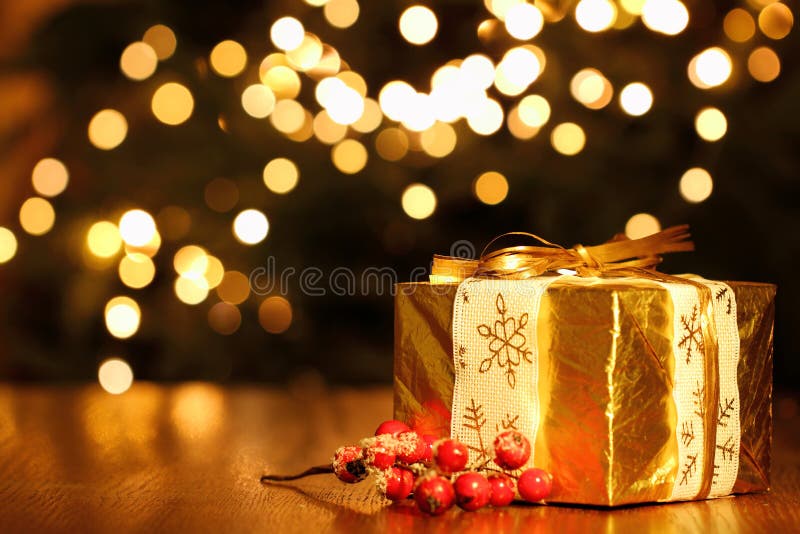 Gift Box Against Christmas Lights Background