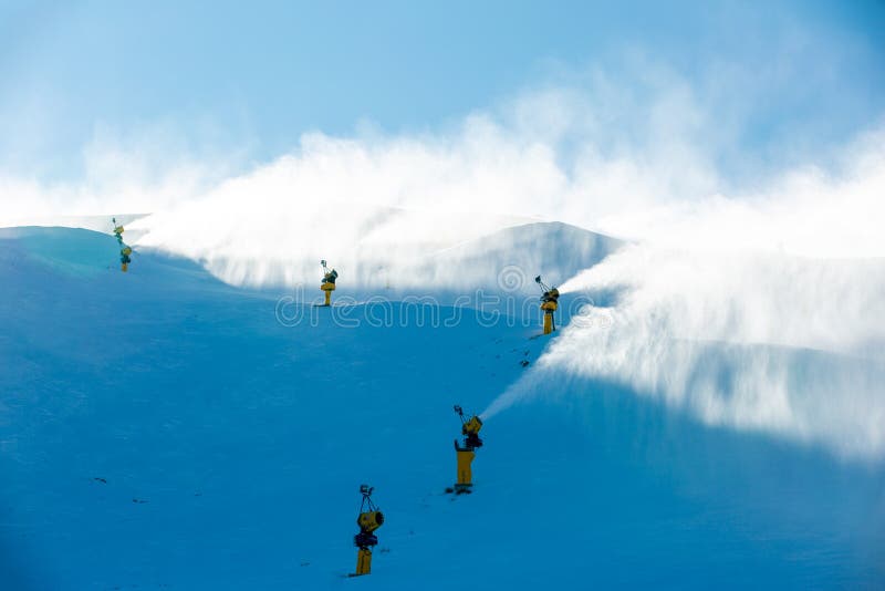 Snow Making Machine or Snow Gun at Ski Fields on Snow Peak Stock Photo