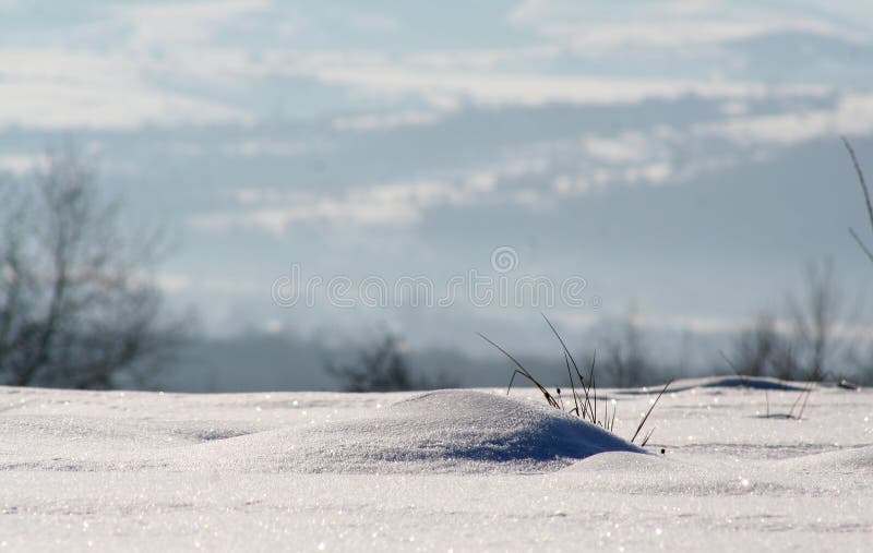 Download Snow Mound Against The Background Of The Mountains. Stock ...