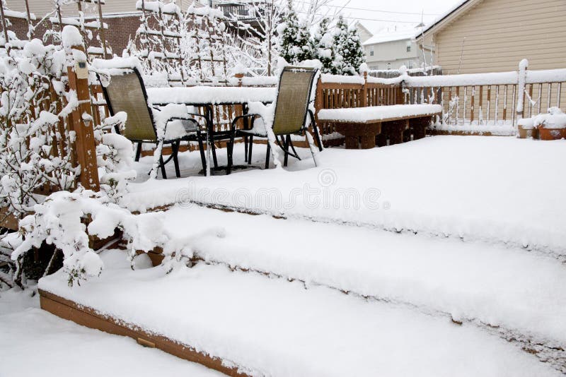 Snow on patio.