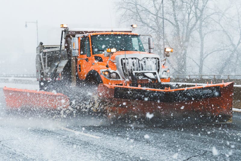 Snow plough truck vehicle ploughing streets highway during nor easter in new england connecticut royalty free stock images Snow plough truck vehicle ploughing streets highway during nor easter in new england connecticut royalty free stock images