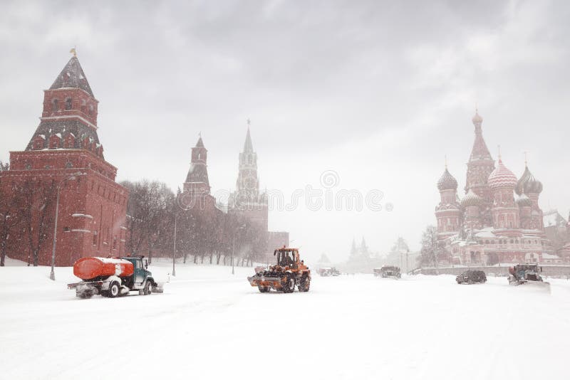 Snow-remover trucks and tractor near Red Square
