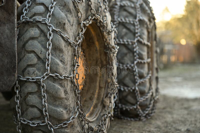 Snow tire chains on big truck wheel