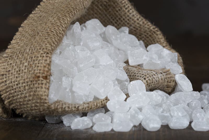 Candy Sugar in a Bag and Sugar on a Stick. Stock Photo Image of black