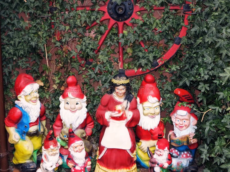Snow White and the Seven Dwarfs in a garden of the fairy tale town Steinau a.d.Straße, Germany stock photo Snow White and the Seven Dwarfs in a garden of the fairy tale town Steinau a.d.Straße, Germany stock photo