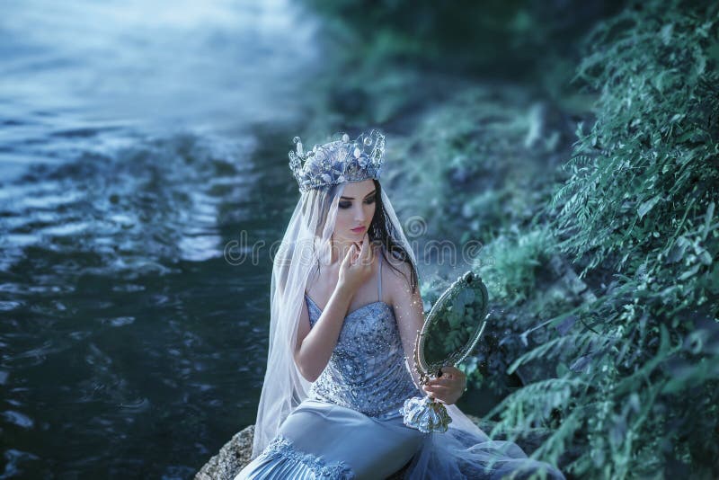 Young princess in a silver dress