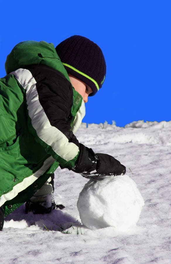 Boy throwing snowball. stock image. Image of action, color 3420361