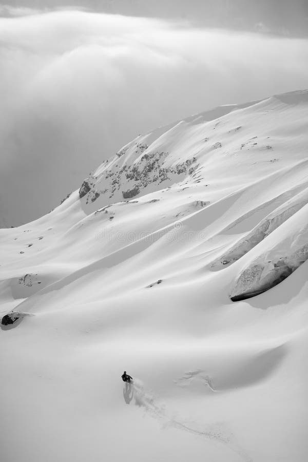 Snowboard freeride in high mountains