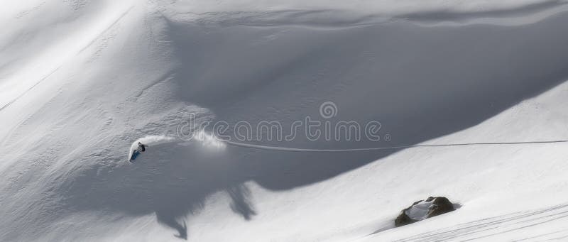 Snowboard freeride in high mountains