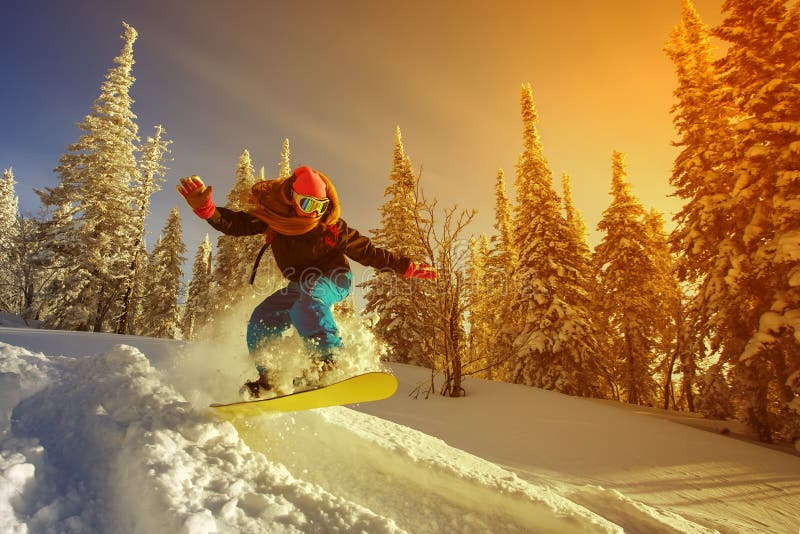 Snowboarder jumping stock image
