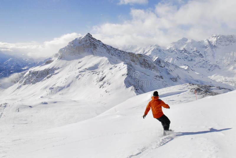 Snowboarder on a mountain background