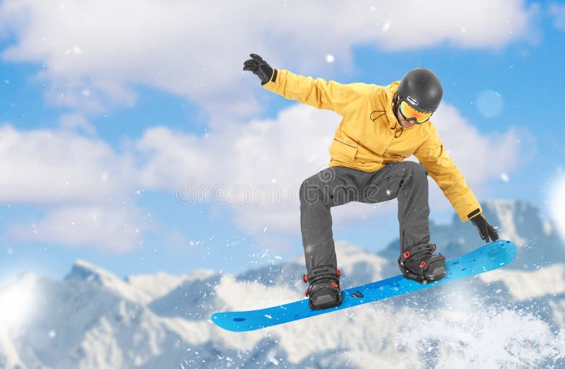 Snowboarder Performing a Tail Grab Stock Photo Image of gripping
