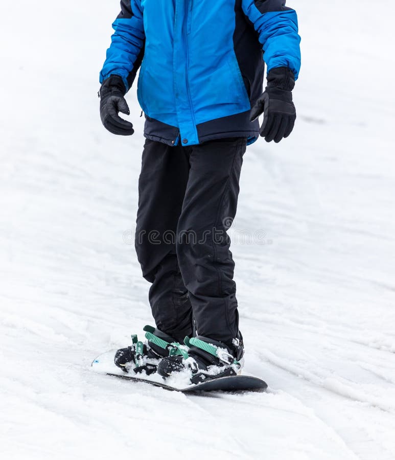 Snowboarder sulla neve fotografie stock libere da diritti