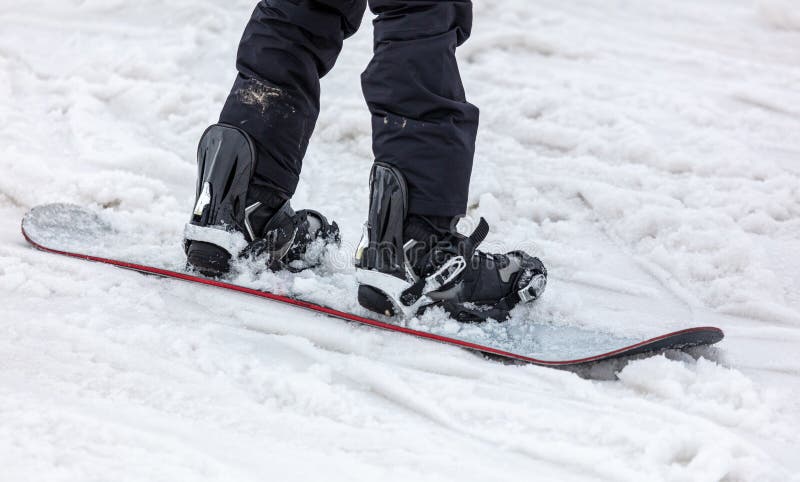 Snowboarder sulla neve. immagini stock libere da diritti